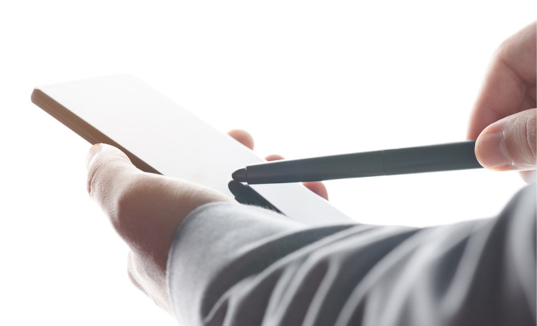 man signing digitally