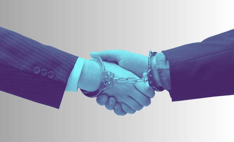 Handshake with handcuffs