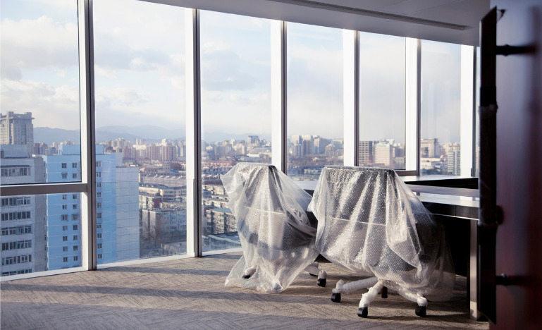 Offcie chairs covered in bubble wrap