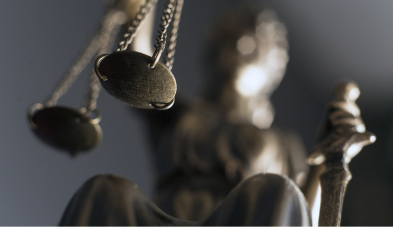 Lady justice blurred