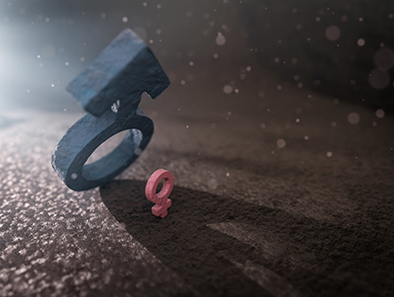 A large blue male symbol casts a shadow over a small pink female symbol on a textured surface, conveying a notion of imbalance.