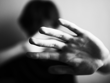 18 years old guy defends himself with his palm isolated