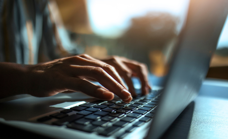 Hands on on a computer keyboard
