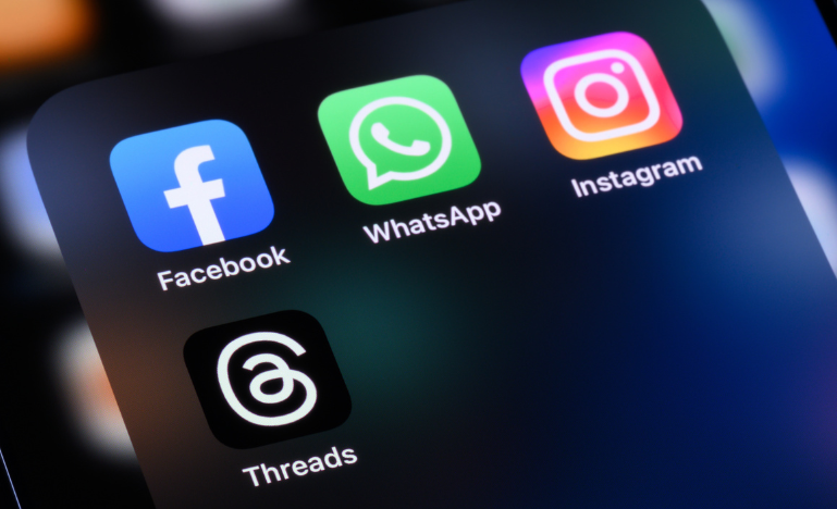 Social media app icons on a phone