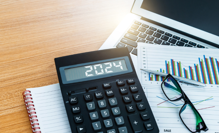Calculator, computer and tax documents