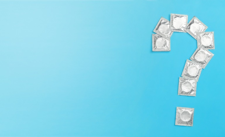 Condoms in the shape of a question mark