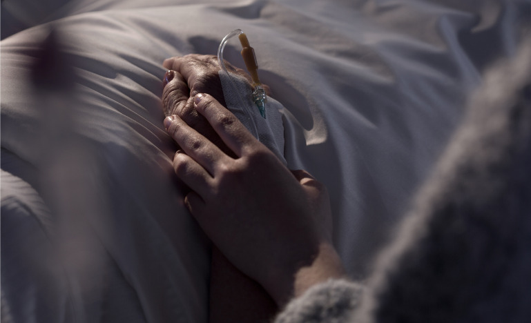 Support to a dying patient