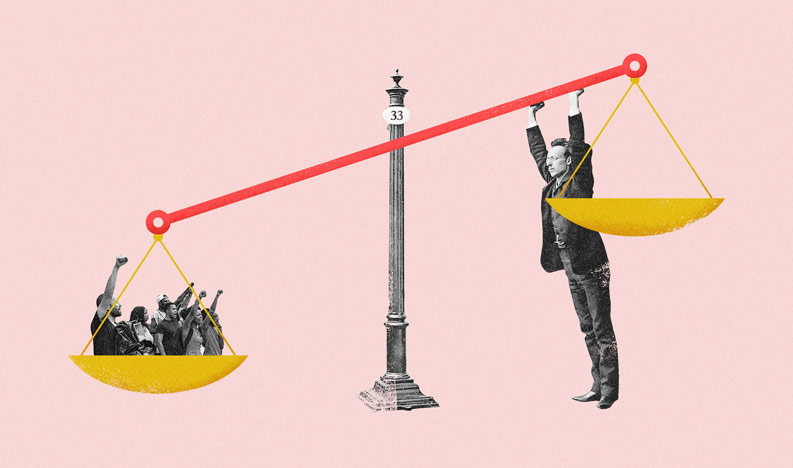 Man holding up scales of justice