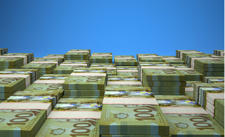 Close-up of stacks of Canadian bills