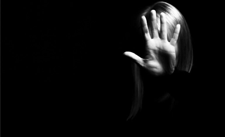Woman showing stop with her hand