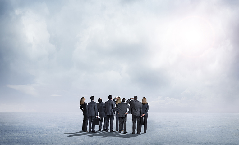 Group Of Businesspeople Looking For Direction