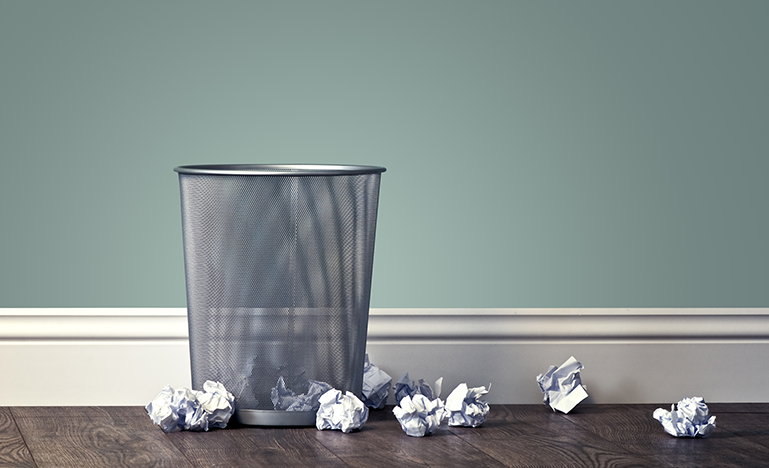 Trash can with Crumbled up Notes
