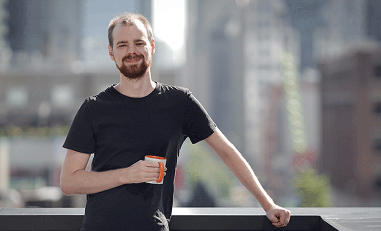 Man holding coffee cup
