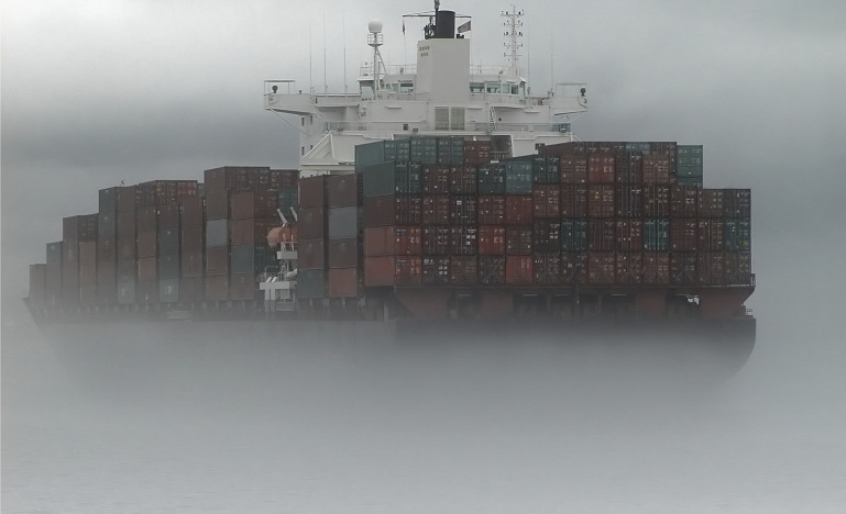 Cargo ship in the fog