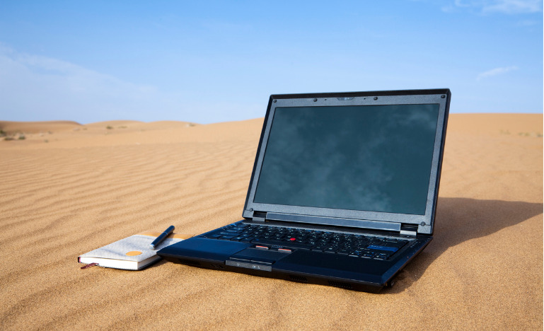 laptop in a desert