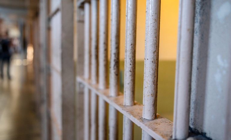 The bars of a jail cell