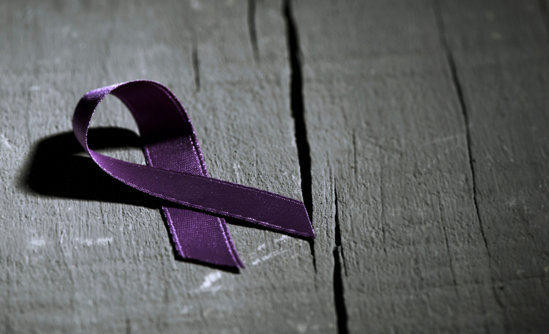 A purple ribbon for awareness about ending gender-based violence