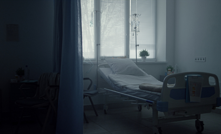 An empty hospital bed