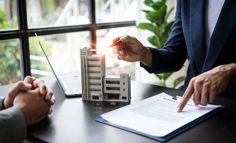 Two people meeting at a desk
