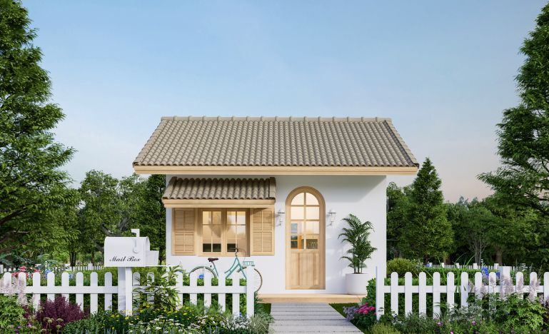 A house and a white picket fence