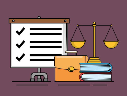 A briefcase, pile of books and scales of justice