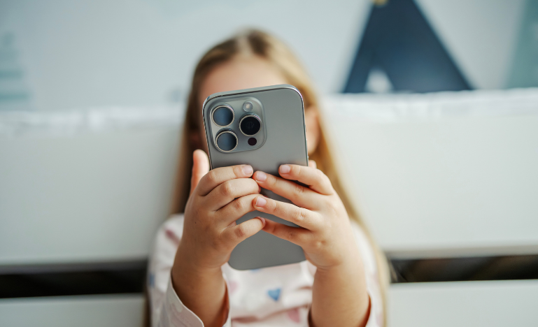 A child on a smartphone