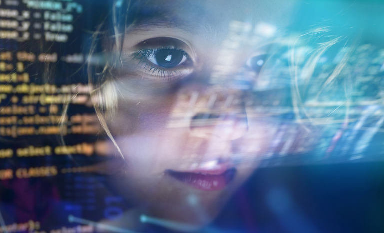 A child looks at a hollogram