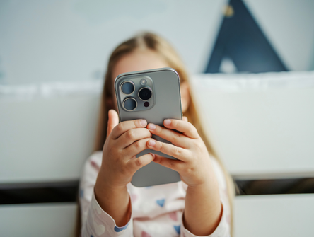 A child on a smartphone