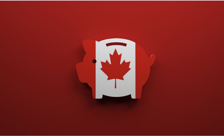A piggy bank with a Canadian flag